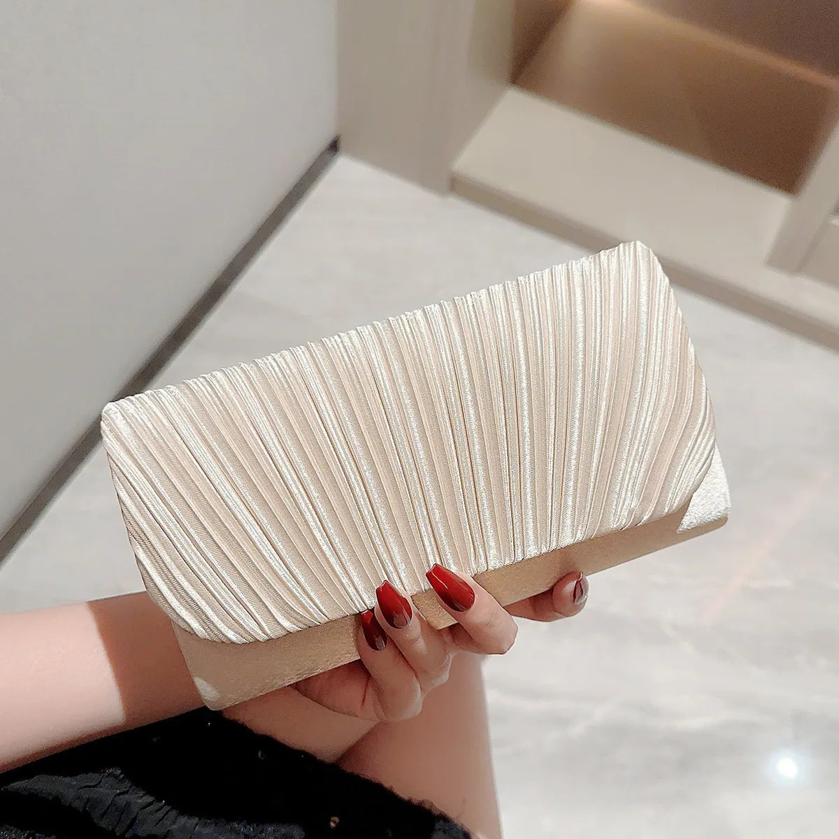 Cartera de fiesta sobre plegable
